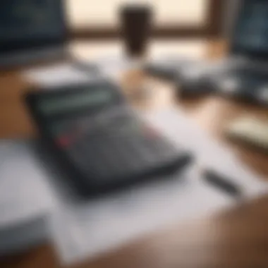 A calculator and financial documents on a desk