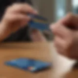 A young adult reviewing credit card options with a financial advisor